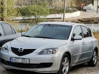 Mazda 3 foto 1