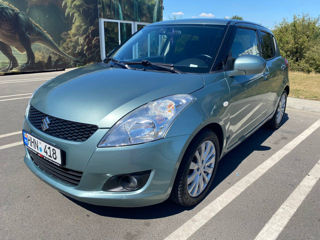 Suzuki Swift foto 1