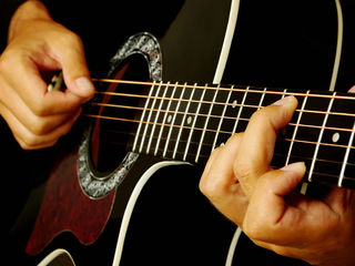 Lecții de chitara foto 1