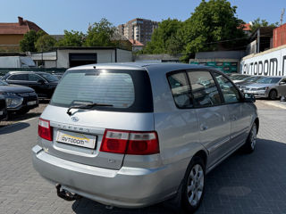 KIA Carens фото 2