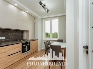 Botanica! 1 cameră cu living în bloc nou, mobilată! 42 mp! foto 2