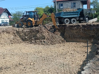 Buldoexcavator +kamaz curățare teren foto 2