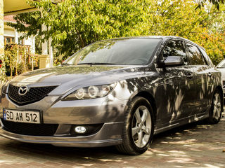 Mazda 3 foto 1