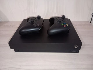 Xbox one X + 2 джойстика + 100 игр foto 1