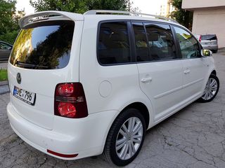 Volkswagen Touran foto 2