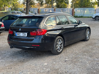 BMW 3 Series Touring foto 3