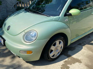 Volkswagen New Beetle foto 2