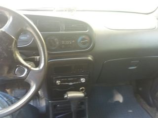 Daihatsu Cuore foto 2