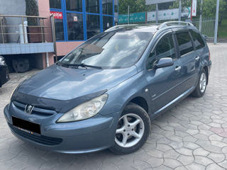 Peugeot 307 foto 1