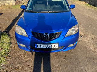 Mazda 3 foto 1