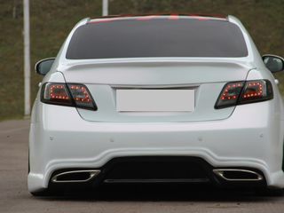 Toyota тюнинг, спойлер, накладки на пороги, накладка на бампер, фары, тюнинг тойота стопы, оптика foto 0