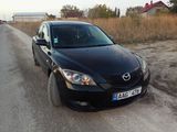 Mazda 3 foto 1