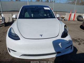 Tesla Model Y foto 11