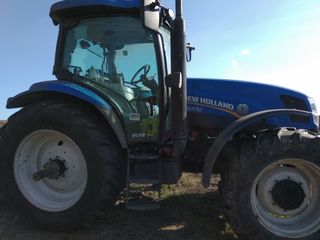 Трактор NewHolland t6070 foto 4