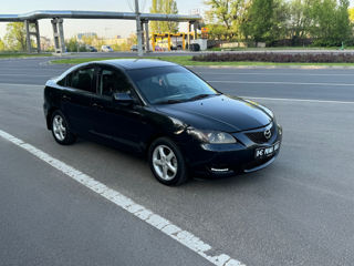 Mazda 3 foto 1