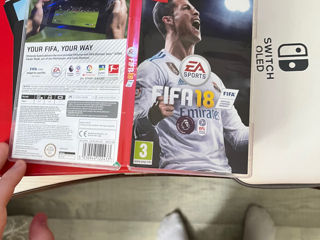 Vând nintendo switch oled nou cu o joacă fifa 18 și cu o husă de purtat foto 7