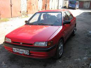 Mazda 323 все модели с 1993 до 2004 foto 4