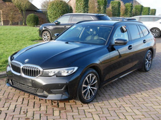 BMW 3 Series Touring foto 2