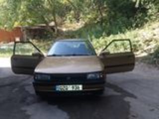 Mazda 323 foto 1