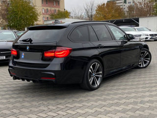 BMW 3 Series Touring foto 3