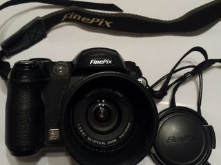 Фотоаппарат цифровой компактный Fujifilm FinePix S5500 и фото кассеты коробочки для пленок foto 4