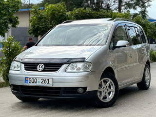 Volkswagen Touran foto 1