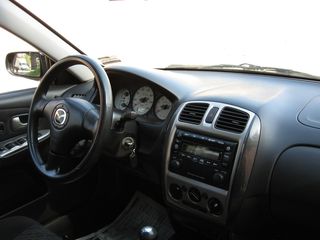 Mazda 323 foto 3