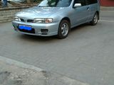 Nissan Almera foto 1