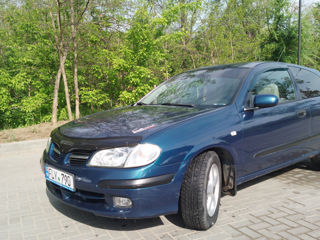 Nissan Almera foto 1