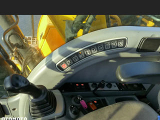 JCB JS 145W pe roți foto 5