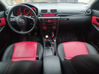 Mazda 3 foto 1