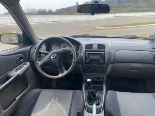 Mazda 323 foto 8