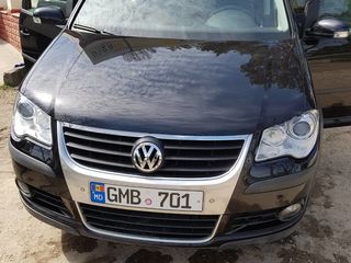 Volkswagen Touran foto 1