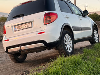 Suzuki SX4 foto 2