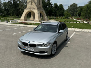 BMW 3 Series Touring foto 2