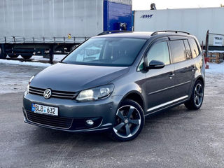 Volkswagen Touran foto 1