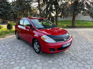 Nissan Tiida фото 1