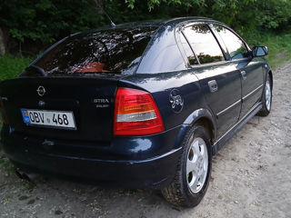 Opel Astra фото 3