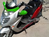 Kymco GrandDink 250 foto 1