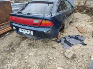 Mazda 323,323F sunt aproape toate piesele. foto 5