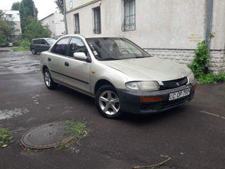 Mazda 323 foto 1