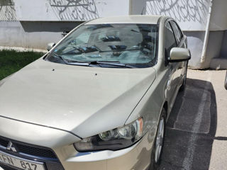 Mitsubishi Lancer фото 0