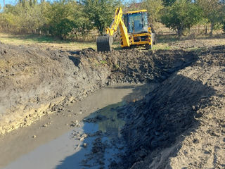 Prestări servicii buldoexcavator. foto 7