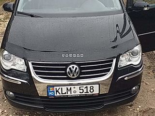 Volkswagen Touran foto 2