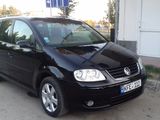 Volkswagen Touran foto 1