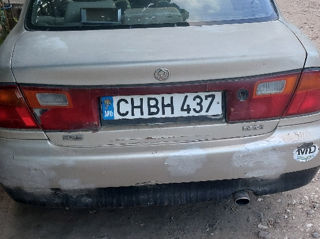 Mazda 323 foto 1