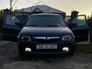 Mazda 323 фото 4