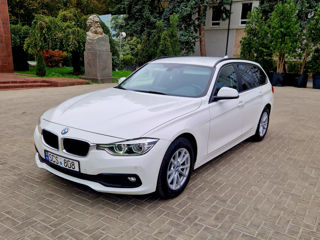 BMW 3 Series Touring foto 2