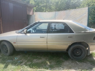 Mazda 323 фото 2