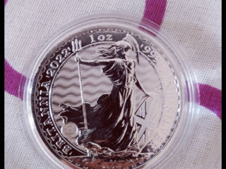 Vând moneda de argint Pur foto 2